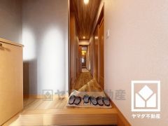 シンプルで洗練された玄関スペース。帰るたびにホッとできる、心地よい住まいの入り口。